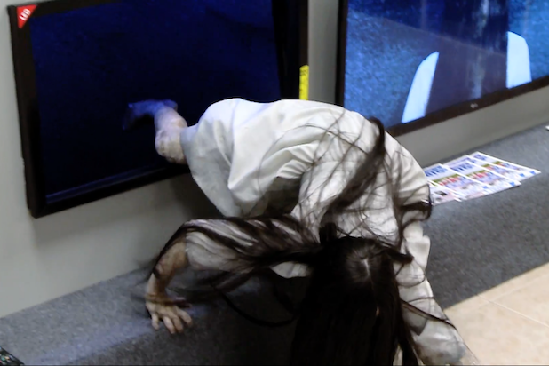 618px x 412px - Watch Girl From 'The Ring' Crawl Out of TVs and Prank Shoppers (Video)