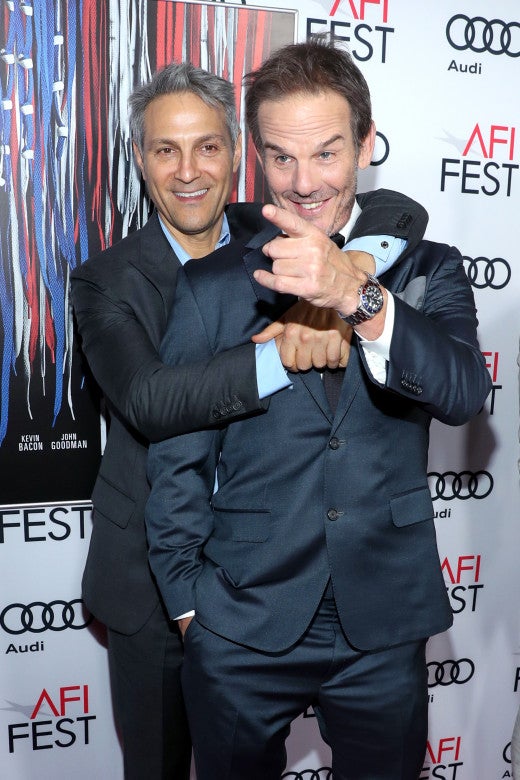 HOLLYWOOD, CA - NOVEMBER 17: Talent agent and Co-CEO of William Morris Endeavor, Ari Emanuel (L) and director Peter Berg attend the premiere of "Patriots Day" at AFI Fest 2016, presented by Audi at The Chinese Theatre on November 17, 2016 in Hollywood, California. (Photo by Jonathan Leibson/Getty Images for Audi)