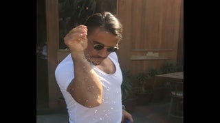 Salt Bae Gets in Valentine’s Spirit, Rubs Down Pig