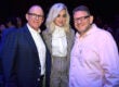 LOS ANGELES, CA - FEBRUARY 11: (L-R) Chairman and CEO of Capitol Music Group Steve Barnett, recording artist Katy Perry, and Chief Executive Officer of Universal Music Group Lucian Grainge attend Sir Lucian Grainge's 2