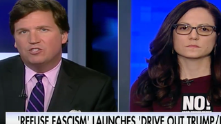 Tucker Carlson Battles Anti-Trump Protester Who Compared POTUS to Hitler (Video)
