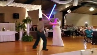Watch Newlyweds Have a Light Saber Battle Instead of First Dance (Video)