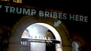 Artist Goes Rogue at Trump’s DC Hotel With ‘Pay Trump Bribes Here’ Projections (Video)
