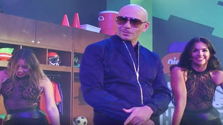 Russell Wilson Parties With Pitbull for Nickelodeon’s ‘Kids’ Choice Sports’ (Exclusive Video)