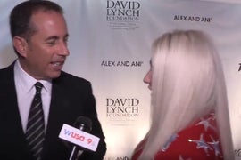 Jerry Seinfeld Practically Runs From Kesha as She Tries to Hug Him in Awkward Run-In (Video)