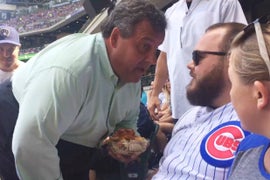 Watch Chris Christie Get in Heckler’s Face Without Spilling His Nachos (Video)