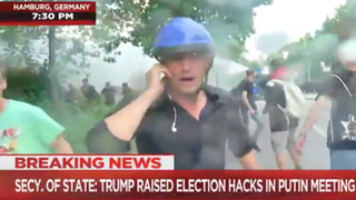 Watch NBC Correspondent Dodge Water Cannon as Police, Protesters Clash in Germany (Video)