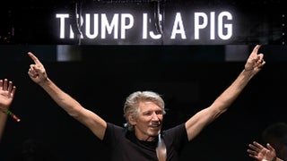 Roger Waters Blasts ‘Buffoon’ POTUS With Neon Anti-Trump Images in Concert (Video)