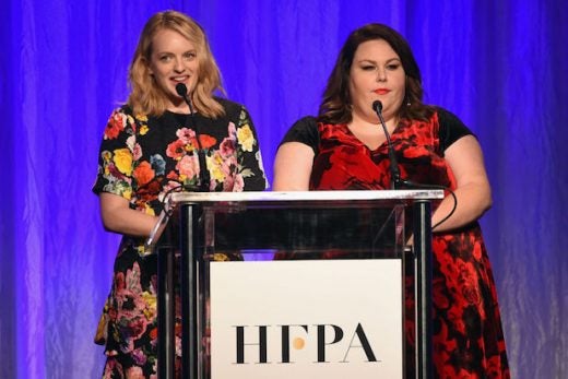 BEVERLY HILLS, CA - AUGUST 02: Elisabeth Moss and Chrissy Metz speak onstage at the Hollywood Foreign Press Association's Grants Banquet at the Beverly Wilshire Four Seasons Hotel on August 2, 2017 in Beverly Hills, California. (Photo by Kevin Winter/Getty Images)