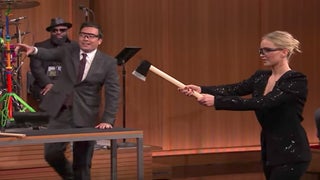 Jennifer Lawrence Falls to Surprisingly Good Jimmy Fallon in Axe-Throwing Challenge (Video)