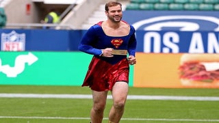 Arizona Cardinals’ Drew Stanton Warms Up… in a Supergirl Outfit