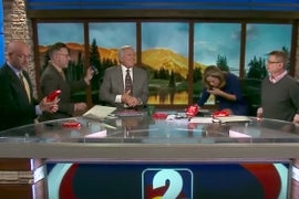 Watch Local TV Anchor Puke on Camera After Eating Extra Spicy Chip (Video)