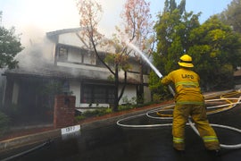 LA Wildfires: Bel-Air Residents Return to Survey Damage After Thousands Forced to Evacuate