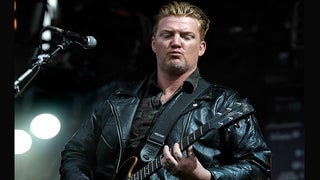 Queens of the Stone Age Frontman Kicks Photographer in Face at KROQ Concert (Video)