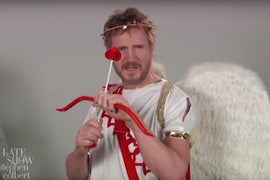 Watch Liam Neeson Audition to Be Cupid This Valentine’s Day (Video)