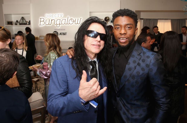 Tommy Wiseau (L) and Chadwick Boseman pose at the DIRECTV BUNGALOW presented by AT&T at the 2018 Film Independent Spirit Awards on March 3, Tommy Wiseau (L) and Chadwick Boseman pose at the DIRECTV BUNGALOW presented by AT&T at the 2018 Film Independent Spirit Awards on March 3,