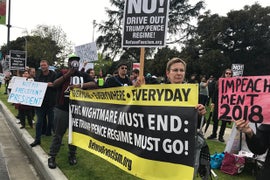 Protestors Greet Donald Trump’s LA Trip With Jeers and an Inflatable POTUS Holding a KKK Hood