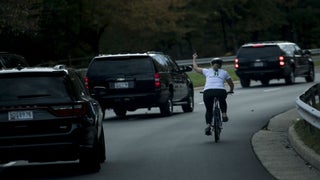Woman Fired After She Flipped Off Trump in Viral Photo Sues Ex Employer