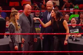 #ICYMI: Watch WWE Exec Stephanie McMahon Slam Ronda Rousey Through a Table on ‘Raw’ (Video)