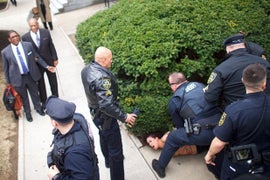 Topless Woman Charges at Bill Cosby on First Day of His Retrial (Video)