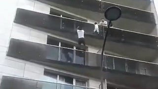 Watch French Immigrant Hero Save Child Dangling From 4-Story Balcony (Video)