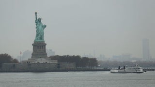 Woman Climbs Statue of Liberty After Protest to Abolish ICE (Video)