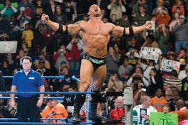 WrestleMania 35: Watch Batista Get Powerbombed Onto Steel Steps in WWE Return (Video)