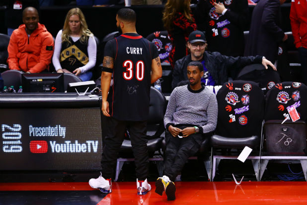 drake wearing curry jersey