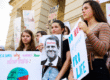 Young women from Paideia High School hold signs during a protest against recently passed abortion ban bills at the Georgia State Capitol building, on May 21, 2019 in Atlanta, Georgia. The Georgia "heartbeat" bill would ban abortion when a fetal heartbeat is detected