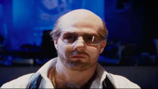 Tom Cruise Brings His Les Grossman Character From ‘Tropic Thunder’ to Comic-Con (Video)