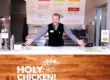 Morgan Spurlock pictured at the pop-up chicken restaurant he opened for his latest documentary, "Super Size Me 2: Holy Chicken"