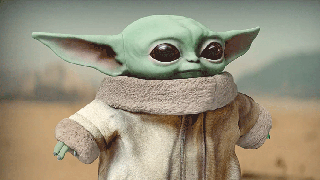 Everyone Is Putting Baby Yoda on Top of Their Christmas Trees This Year