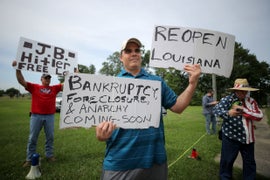 White House Economic Adviser Incorrectly Compares Stay-at-Home Protestors to Rosa Parks