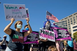 Women’s March Protesters Rally Against Trump, Amy Coney Barrett: ‘Women Are Going to Decide This Election’