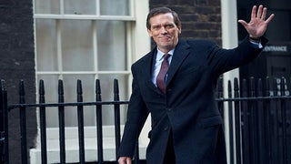 Hugh Laurie Is a Shady Politician in Trailer for PBS Masterpiece Thriller ‘Roadkill’ (Video)