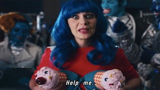 Zooey Deschanel Fulfills Her Destiny to Play Katy Perry’s Look-Alike in Alien-Infested Music Video