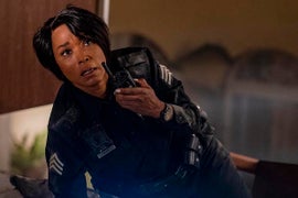 ‘9-1-1’ Showrunner on Athena’s Literal Cliffhanger, Maddie and Chimney’s COVID Pregnancy Problems