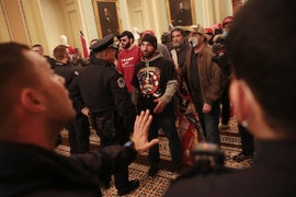 Pro-Trump Rioters Storm the Capitol, Congress in Lockdown