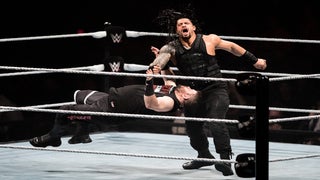 WWE ‘Royal Rumble’: Roman Reigns Just Ran Kevin Owens Over With a Friggin’ Golf Cart (Video)
