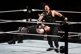 WWE ‘Royal Rumble’: Roman Reigns Just Ran Kevin Owens Over With a Friggin’ Golf Cart (Video)