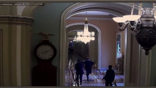 Security Footage Shows Officer Lead Mitt Romney to Safety During Capitol Riot (Video)
