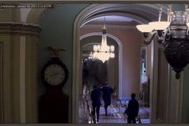 Security Footage Shows Officer Lead Mitt Romney to Safety During Capitol Riot (Video)