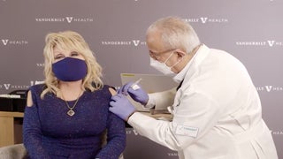 Watch as COVID Vaccine Funder Dolly Parton ‘Gets a Dose of Her Own Medicine’ (Video)