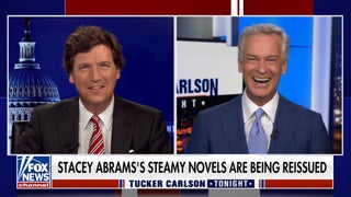 Tucker Carlson Seems Kind of Turned on by Stacey Abrams’ Romance Novels (Video)
