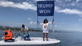 Osama Bin Laden’s Niece Protests Biden-Putin Summit With ‘Trump Won’ Flag (Video)