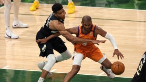 Giannis Antetokounmpo #34 of the Milwaukee Bucks Chris Paul #3