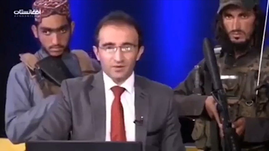 Taliban militants TV host