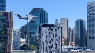 Watch Massive Cargo Plane ‘Buzz the Tower’ in Downtown Brisbane, Australia (Video)