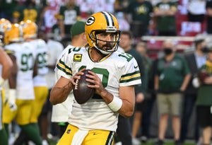 Aaron Rodgers #12 of the Green Bay Packers prepares for a game against the Arizona Cardinals at State Farm Stadium on October 28, 2021 in Glendale, Arizona