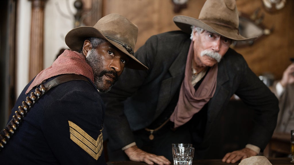 1883, LaMonica Garrett as Thomas and Sam Elliot as Shea of the Paramount+ original series 1883.